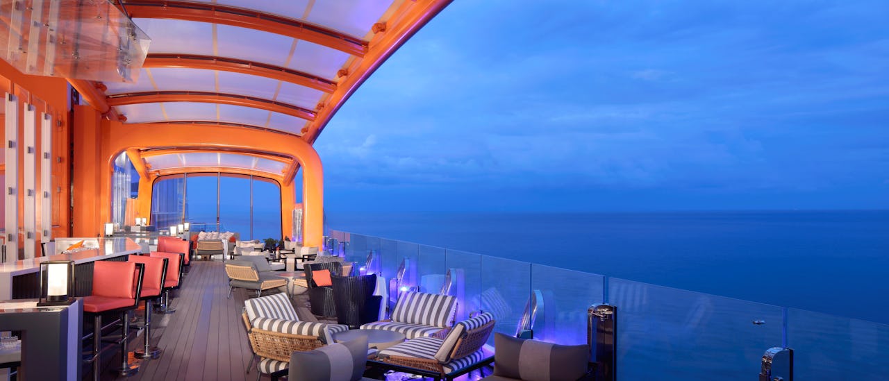 Dine, drink, and soar above the sea on the Magic Carpet, the world’s first cantilevered, floating platform