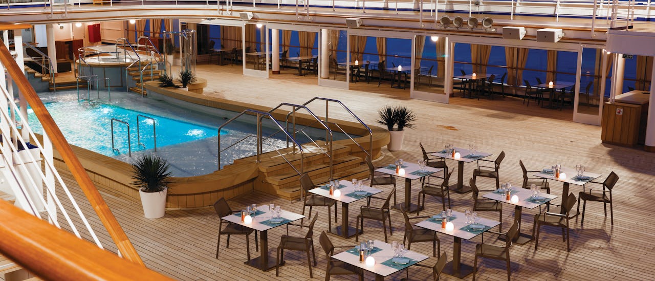 An elegant dinner nearby the swimming pool at The Grill