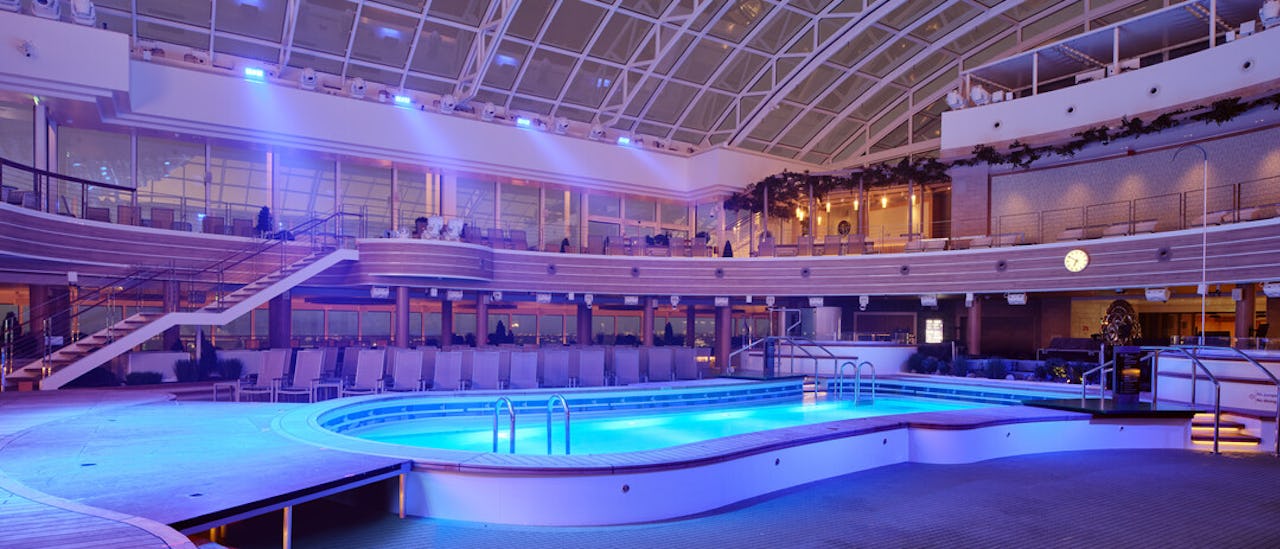 The 970m² retractable SkyDome glass roof is the special entertainment feature of the ship