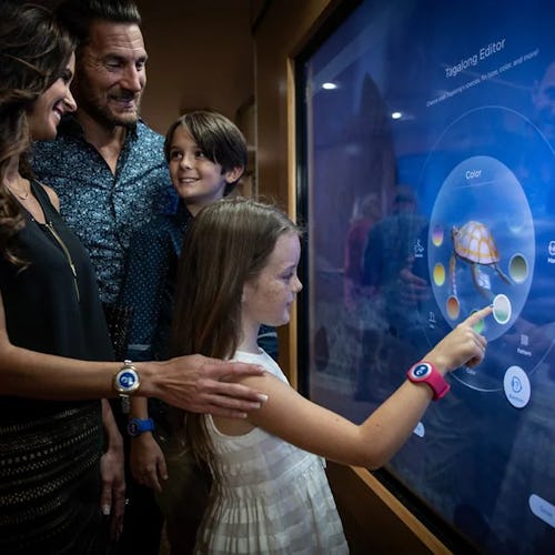 Guest using OceanMedallion® for keyless entry and on-demand service aboard Princess Cruises.