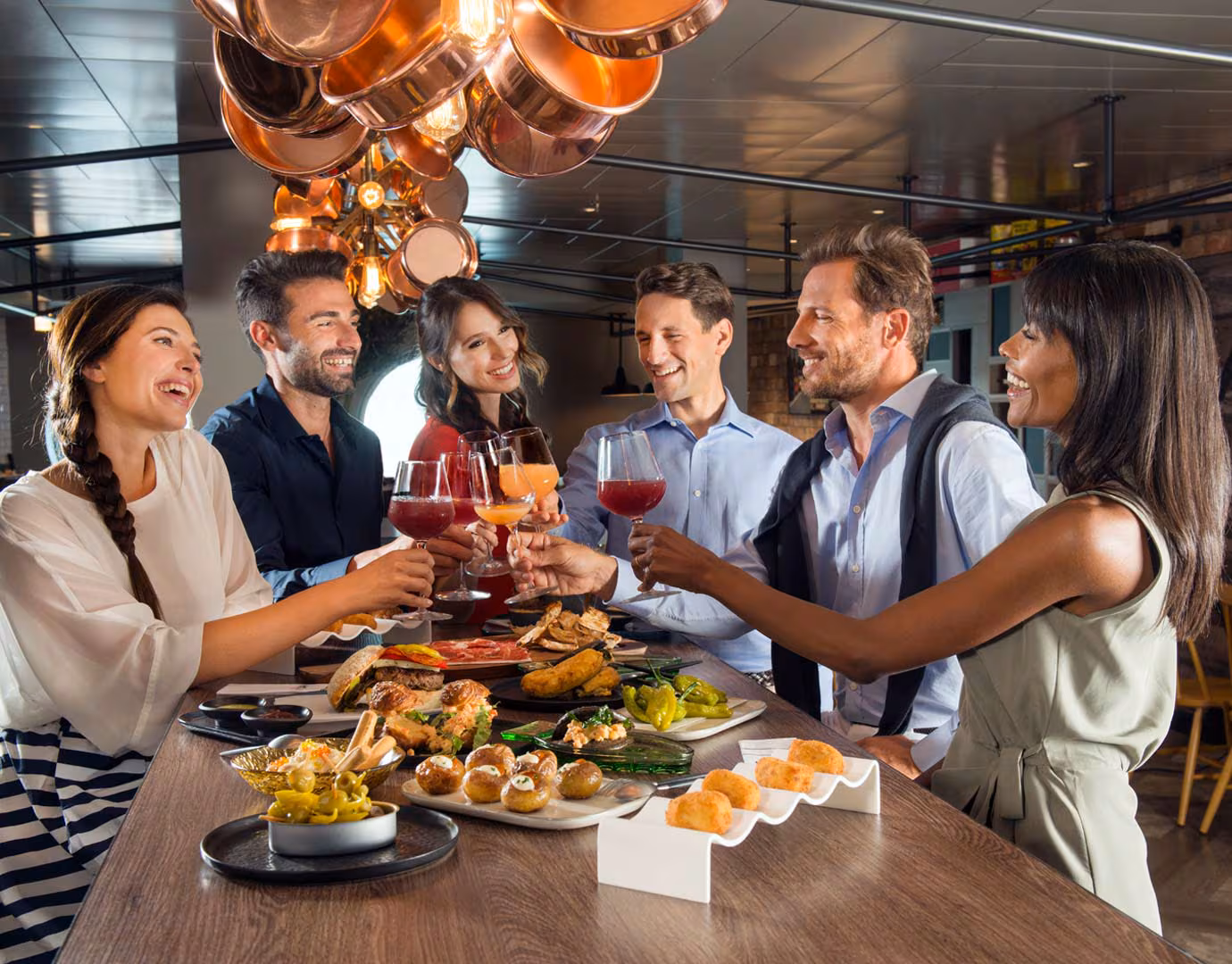 Couple dining at an upscale restaurant onboard MSC Cruises, featuring Mediterranean-inspired cuisine.