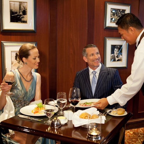 Guests enjoying fine dining aboard Azamara, featuring locally inspired cuisine and elegant open-seating restaurants.