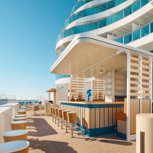 Guests enjoying Costa Cruises’ signature Italian style, surrounded by bold décor and vibrant onboard ambiance.